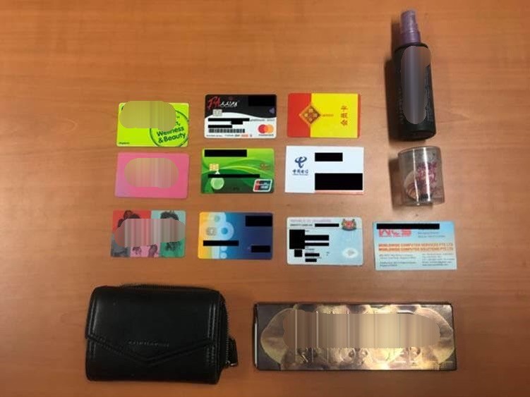 20190424_arrest_Duo_arrested_for_unauthorised_transactions_using_stolen_credit_card_CAD_1
