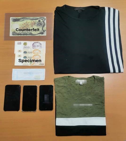 20190824_ARREST_Two_Men_Arrested_For_Using_Counterfeit_S10000_Orchid_Series_Note_CAD