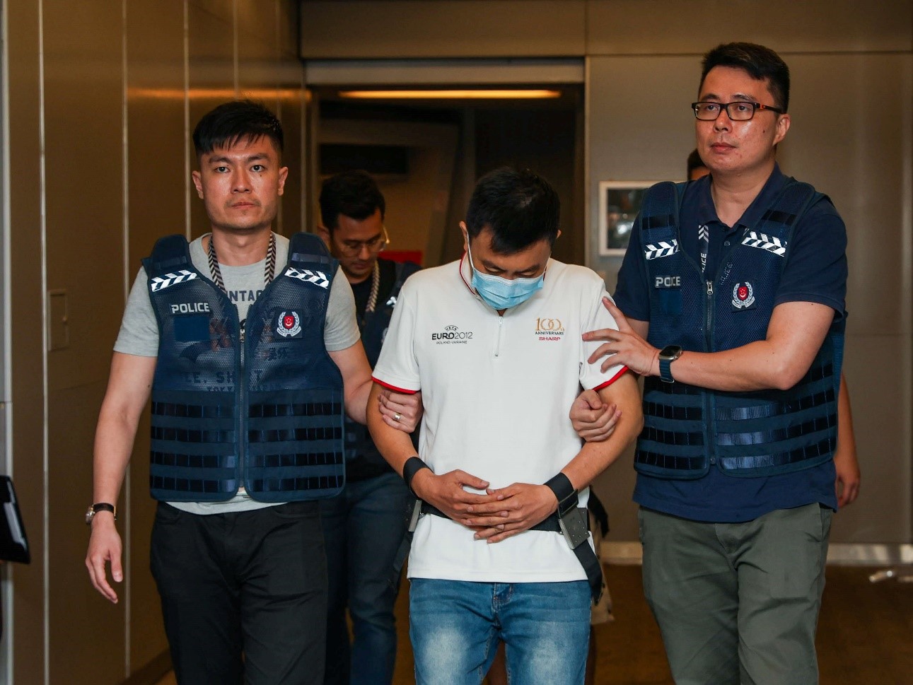 20240614_two_men_extradited_from_malaysia_to_be_charged_for_offences_in_relation_to_malware_scams_1