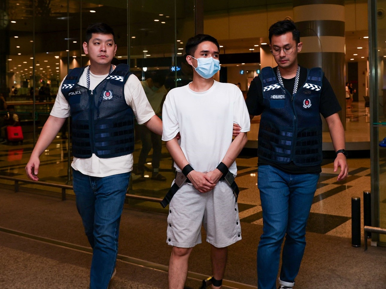 20240614_two_men_extradited_from_malaysia_to_be_charged_for_offences_in_relation_to_malware_scams_2