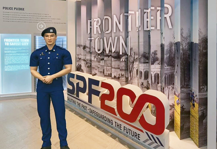 Inspector Clif introducing visitors to the SPF200 “Frontier Town to Safest City” Exhibition. PHOTOS: SPF