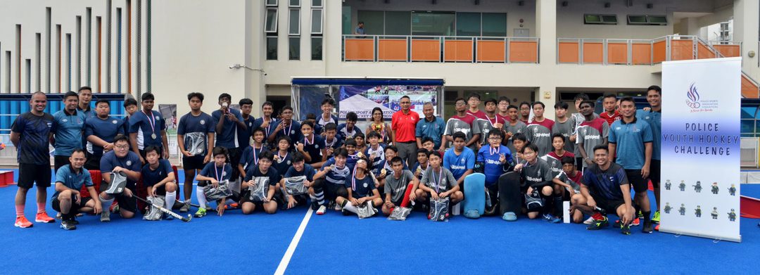 group photo of all youth hockey challenge contestants with guest of honour