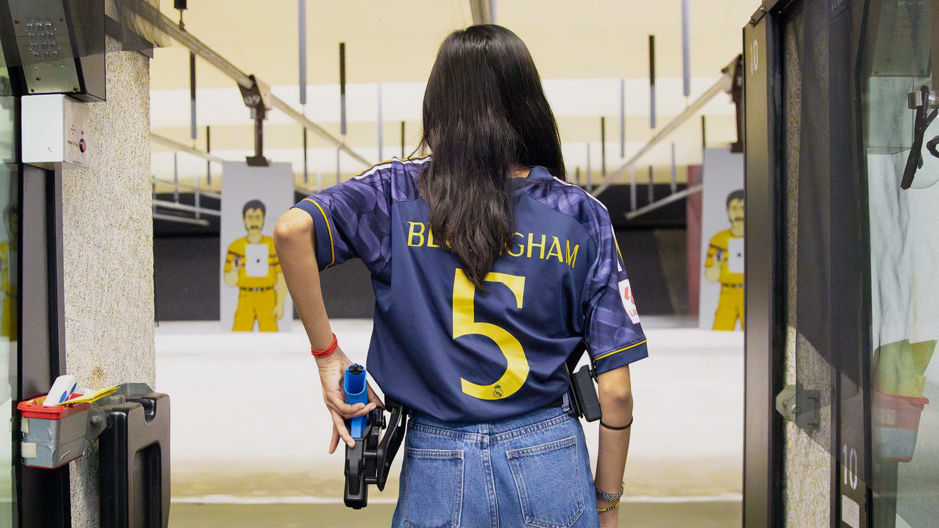 In the firing range, focused and ready to try shooting an FX round. PHOTO: Shavina Sri